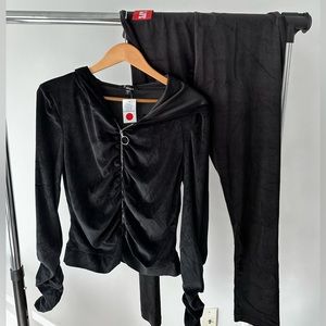 XL Black Sweatsuit from Rainbow. Never worn, tags still on.